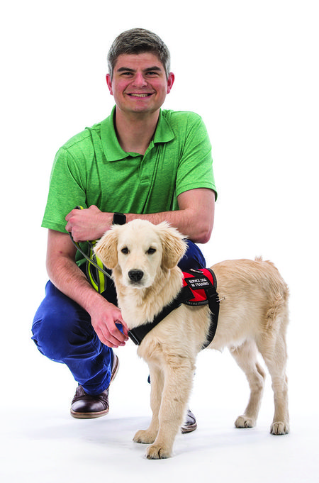 Hearing service dog Bodie  is new staffer in Risk Management