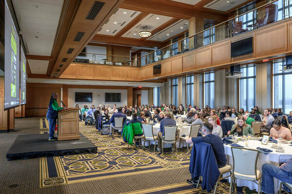 Employees gather in Corbett Family Hall's Downes Ballroom for the Spring Staff Unity Summit, April 2024.