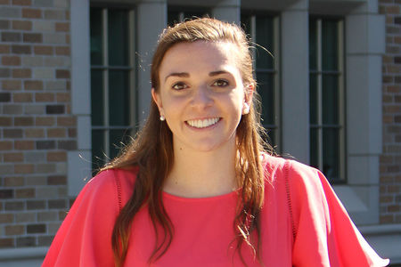 International economics major combats poverty through researching and implementing microfinance services