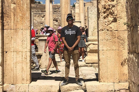 Exploring a new language leads history and political science senior to valuable research and international experiences — and a third major