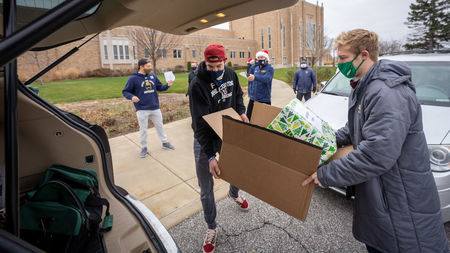 Athletics staff, student-athletes provide gifts to local families amid pandemic