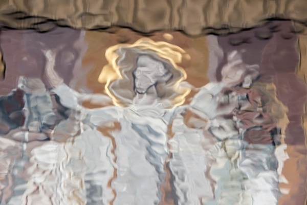 The Word of Life mural, as seen in The Hesburgh Library Reflecting Pool