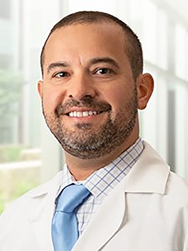Dr. Carlos Gomez-Meade