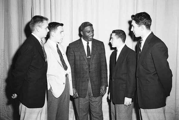 Jackie Robinson meets with students during his 1954 visit to Notre Dame.